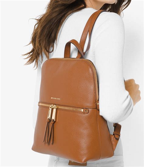 michael kors rhea zip brown backpack|Michael Kors Rhea Zip Medium Slim Backpack .